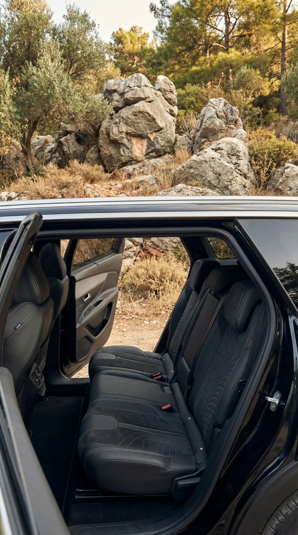Drive Me van interior with sea view behind the vehicle